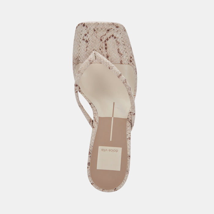 RHYE HEELS IN LT TAUPE EMBOSSED STELLA - Dolce Vita