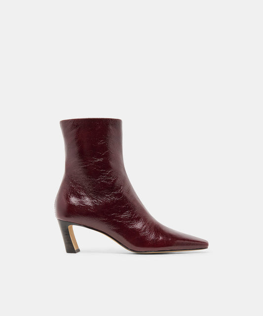 NESLY Oxblood Leather Ankle Booties | Dolce Vita