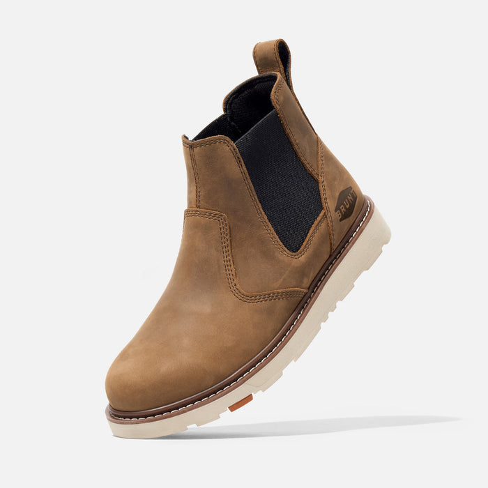 BRUNT Ohman unlined pull-on work boot shown mid-step in a job site setting, EH rated
